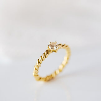 Solitario hilo cruzado Oro 18kt y diamante